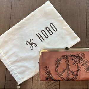 HOBO Dusty Pink Leather Floral Peace Sign Frame Clutch